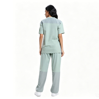 Ensemble d'uniformes médicaux vert menthe frais à blocs de couleur, confortables et amples, pour cliniques, hôpitaux et pharmacies