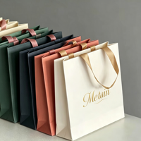 Sac à main en carton blanc résistant, capacité de 6 à 9 kg, logo imprimé personnalisé, design minimaliste élégant pour emballage cadeau de boutique