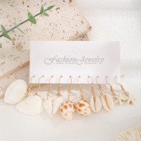 Lot de 10 paires de boucles d'oreilles pendantes en coquillages naturels (coquille Saint-Jacques, cauri, étoile de mer) avec carte de présentation, cadeau de bijoux