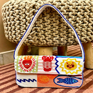 Handmade Rectangular Canvas Handbag With Colorful Embroidered Symbols And Blue <b>Trim</b> - Product Image 1