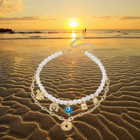 Collier multicouche de style vacances d'été avec fleur de verre oeil de fer à cheval perle médaillon breloque bijoux de mode