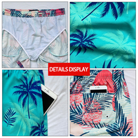Shorts de bain pour hommes imprimés tropicaux en gros, 150 GSM, séchage rapide, avec doublure et poches, tissu élastique, maillot de bain d'été