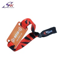 Bracelet en tissu tissé personnalisé en PVC avec interface NFC (13,56 MHz) étanche pour événements festifs et contrôle d'accès hôtelier