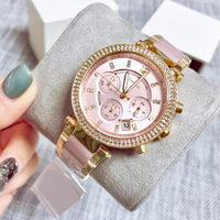 MKOriginals Montre pour femme en or rose et diamants, bracelet en acier inoxydable rose, chronographe à quartz