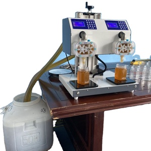 Nouvel équipement apicole 2023 : Machine de remplissage de miel à deux têtes pour bouteilles - Product Image 2