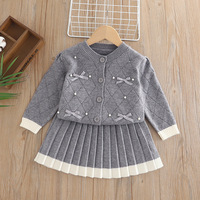 Nouvel ensemble jupe et haut tricoté style preppy pour filles, collection automne-hiver, avec nœud papillon pour enfants