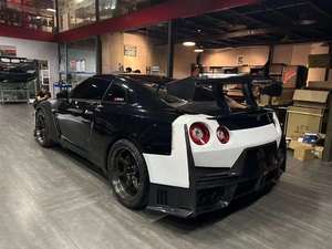 ชุดแต่งรอบคันคุณภาพสูงสำหรับรถยนต์ GT-R R35 รุ่นปี <span class=keywords><strong>2024</strong></span> <span class=keywords><strong>NISMO</strong></span>  กันชนหน้า/หลัง  100%  ประกอบได้พอดี  พร้อมสีรองพื้น + คาร์บอนไฟเบอร์ - Product Image 5