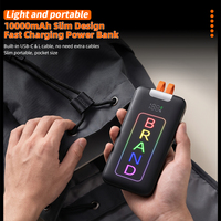 Batterie externe portable 10000 mAh haute capacité avec logo lumineux personnalisé, câbles intégrés, charge rapide PD 22,5 W