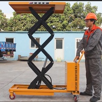 Vente flash Tables élévatrices électriques hydrauliques mobiles à fourche de cisaillement Plateforme élévatrice pour voiture 500 kg Table élévatrice plate