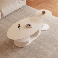 Table basse moderne haut de gamme de style crème, luxe léger, petite taille, style français, ovale, en dalle de pierre frittée