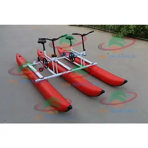 Rojo dos jugadores flotante moto de agua, barco de plátano tubo plegable inflable mar Aqua bicicleta de agua vender barco para deportes de agua