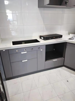 Ensemble de cuisine extérieure modulaire Prima en acier inoxydable moderne avec îlot BBQ, évier, four à pizza, petit réfrigérateur, grill et armoire de cuisine