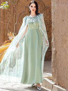 Роскошное платье цвета шалфейной зелени для VIP-мероприятий и гала-вечеров с дизайном в арабском стиле и накидкой. - Product Image 2