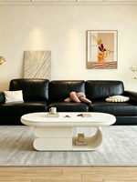 Table basse moderne en pierre avec rangement pour salon et petit appartement, forme ovale, design de luxe léger