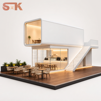 Bâtiment modulaire à deux étages avec espace commercial, espace de repos, espace de réunion et salle de bain, escalier extérieur, conteneur commercial préfabriqué