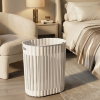 Panier de rangement en plastique ajouré respirant avec poignée de transport confortable, idéal pour le linge sale, la salle de bain et la chambre à coucher