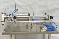 Remplisseuse horizontale pneumatique à tête unique pour liquides