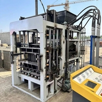 Machine de fabrication de blocs autobloquants QT6-15 sans cuisson, haute productivité, ligne de production automatique de briques en cendres volantes pour l'Afrique