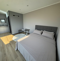 Cabine Apple, maison capsule industrielle, cabine modulaire intelligente préfabriquée, dortoir de chantier à 2 étages en acier solaire, garantie 3 ans