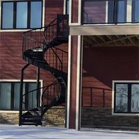 Escalier en colimaçon extérieur en acier pour évacuation en cas d'incendie et accès extérieur