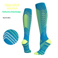 Chaussettes de compression professionnelles en nylon respirant pour la course, le cyclisme et le fitness avec bande réfléchissante et soutien du mollet