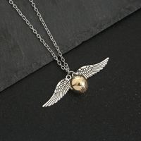 Collier Vintage Snitch d'Or avec Ailes, Bijou pour Fans de Films, Cadeau pour Enfants et Adolescents, Pendentif Balle de Quidditch, Accessoires de Cosplay
