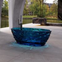 Baignoire autoportante ovale en résine transparente de luxe, surface solide, écologique, pour salle de bain intérieure avec drain
