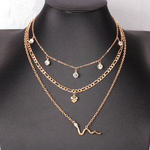 Collar de Serpiente en Capas con Corazón Dorado y Diamantes de Imitación, Joyería de Moda para Fiesta con Múltiples Cadenas - Product Image 1