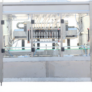 Botella de vidrio Seguimiento Vino Vinagre Agua mineral Líquido Máquina de llenado al vacío para Malta con transportador - Product Image 2