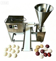 Machine automatique de production et de transformation de boules de pâte spirales et de snacks fourrés pour boulangerie