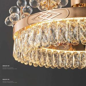 Lustre moderne doré rond de luxe en forme de boule de fleurs en cristal K9 pour la décoration de la maison et du bureau avec base E12 de forme ovale - Product Image 4