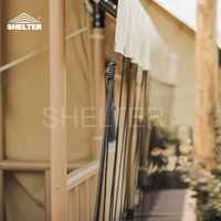 Tentes de glamping de luxe en toile imperméable pour hôtel de safari en plein air avec salle de bain