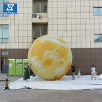 Installation de lune gonflable jaune personnalisée pour la décoration de l'événement du Festival de la Mi-Automne en extérieur
