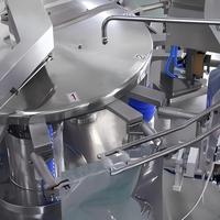 Machine de remplissage et de scellage rotative pour sachets préformés, pour aliments et boissons, équipement d'emballage automatique pour matériaux granulaires