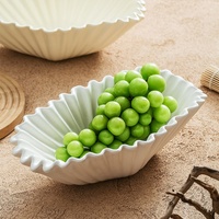 Grote capaciteit witte keramische fruit- en snack schaal, modern minimalistisch design voor voedseldecoratie