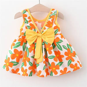 Precio al por mayor Vestido de verano para niñas con lazo, estampado completo, corto por delante y largo por detrás, con volantes, para niñas de las flores y bebés - Product Image 2