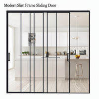 Porte coulissante en verre en aluminium KOMPSTAR, design linéaire, cadre fin noir, cloison avec barres verticales pour cuisine moderne