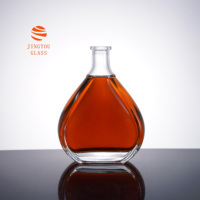 Bouteille de vin en verre en forme de goutte d'eau de 700 ml, logo personnalisable disponible pour les marques de brandy, de vin de fruits et de spiritueux