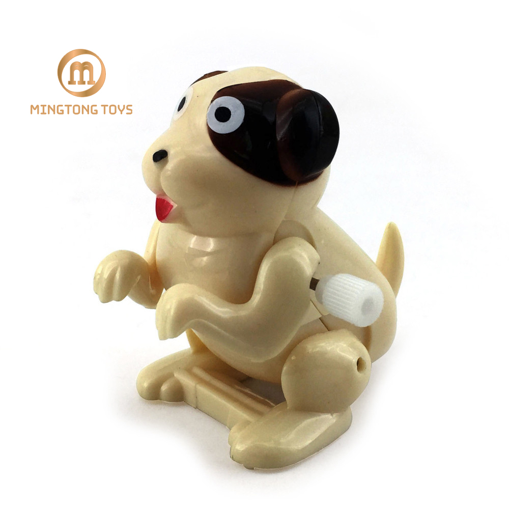 Vendita calda divertente capriola di plastica che salta wind up dog toy