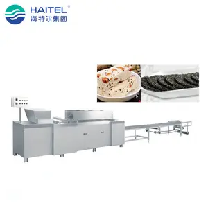 Máquina de fabricación de barras de arroz de caramelo de maní pulido completamente automática de alta productividad China