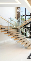 Escalier flottant en U de luxe noir avec monopoteau, marches en chêne blanc et éclairage LED, balustrade en verre, norme américaine