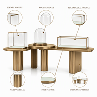Ensemble d'agencements de présentation pour bijouterie bleu marine personnalisé avec comptoirs modulaires, dômes en verre et éclairage LED