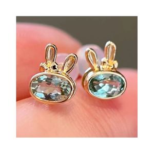 Xinfly Au750 Joyería Fina Diaria Clásica, Pendientes de Oro Puro de 18k con Turmalina Verde Menta en Forma de Conejo con Lazo, Lindos Pendientes de Animales - Product Image 1