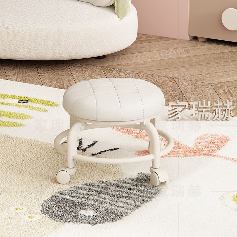 Cojín redondo suave [acolchado] color hueso.