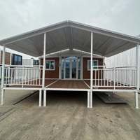 Maisons conteneurs en panneaux sandwich d'acier extensibles de 20 pieds, type bungalow, avec un design moderne et respirant pour une utilisation hôtelière