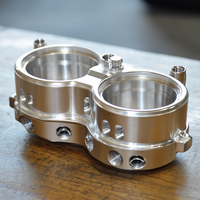 Cuves de carburateur de moto en aluminium CNC haute performance à double sortie, personnalisables et usinées