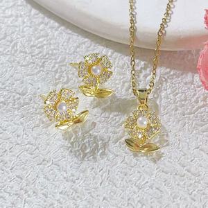 Conjunto de cobre Zircon chapado en oro Cadena de acero inoxidable Flor Mariposa pendientes collar joyería de mujer - Product Image 4