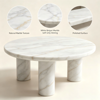 Table basse de luxe en marbre blanc. Table basse élégante en pierre naturelle ronde avec pieds cylindriques pour la décoration moderne du salon.