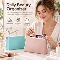 Pochette cosmétique en silicone personnalisée, étanche, pour voyage, avec sangle de poignet, options de logo OEM et fermeture éclair