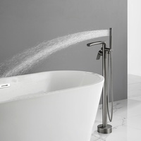 Robinet de baignoire autoportant en laiton gris anthracite avec bec cascade et douchette à main